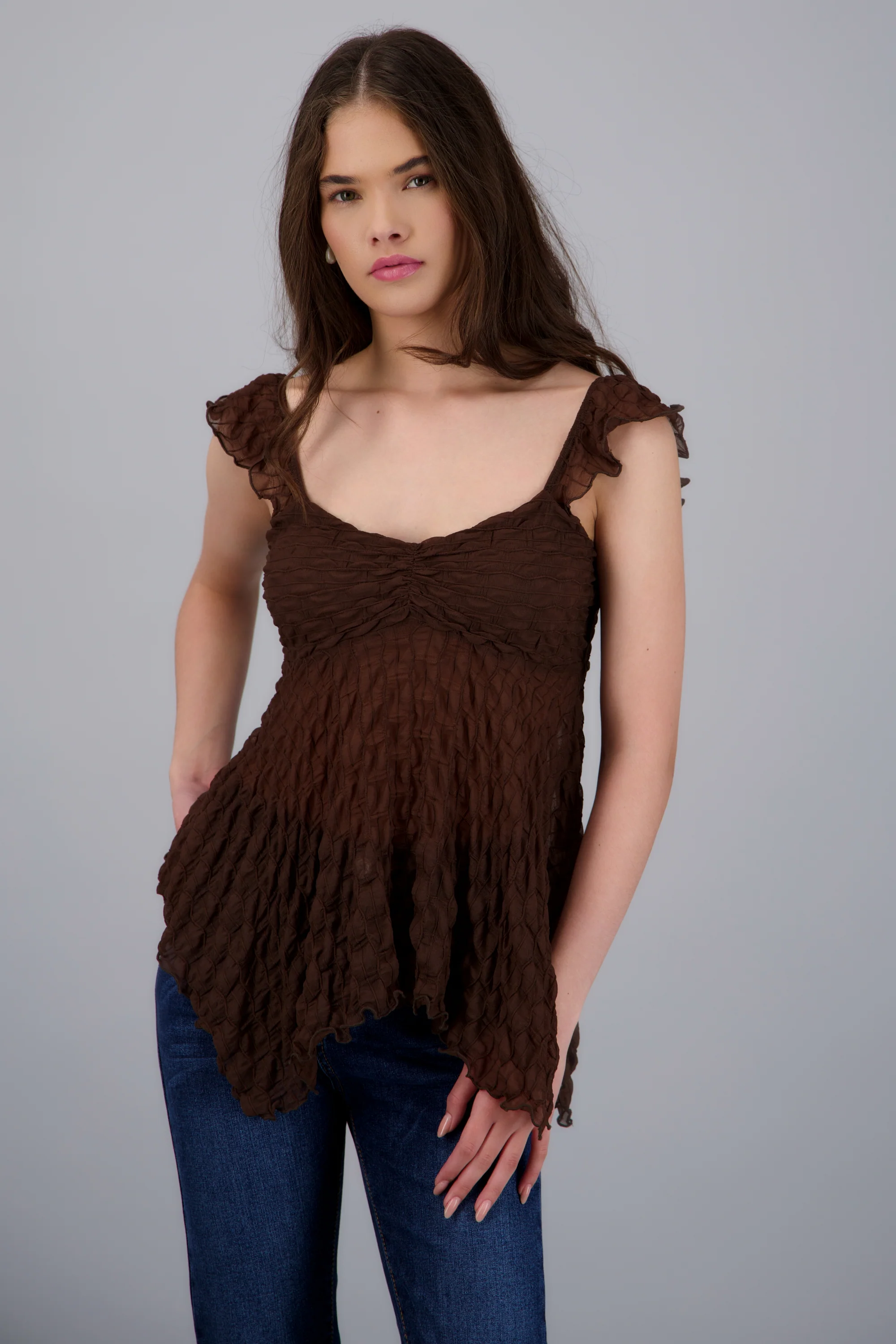 Blusa sin manga asimétrica textura