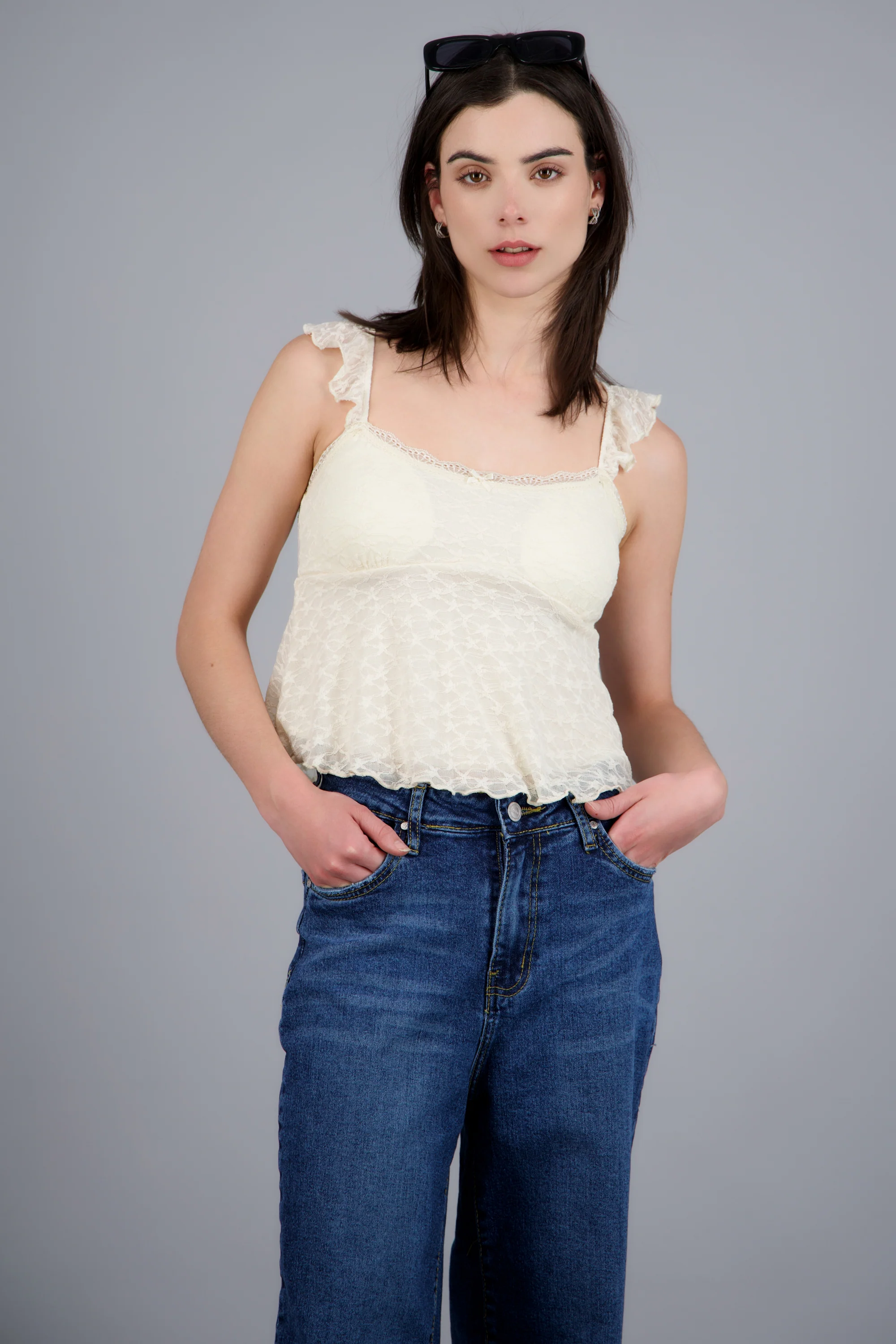 Blusa sin mangas detalle moño con copas
