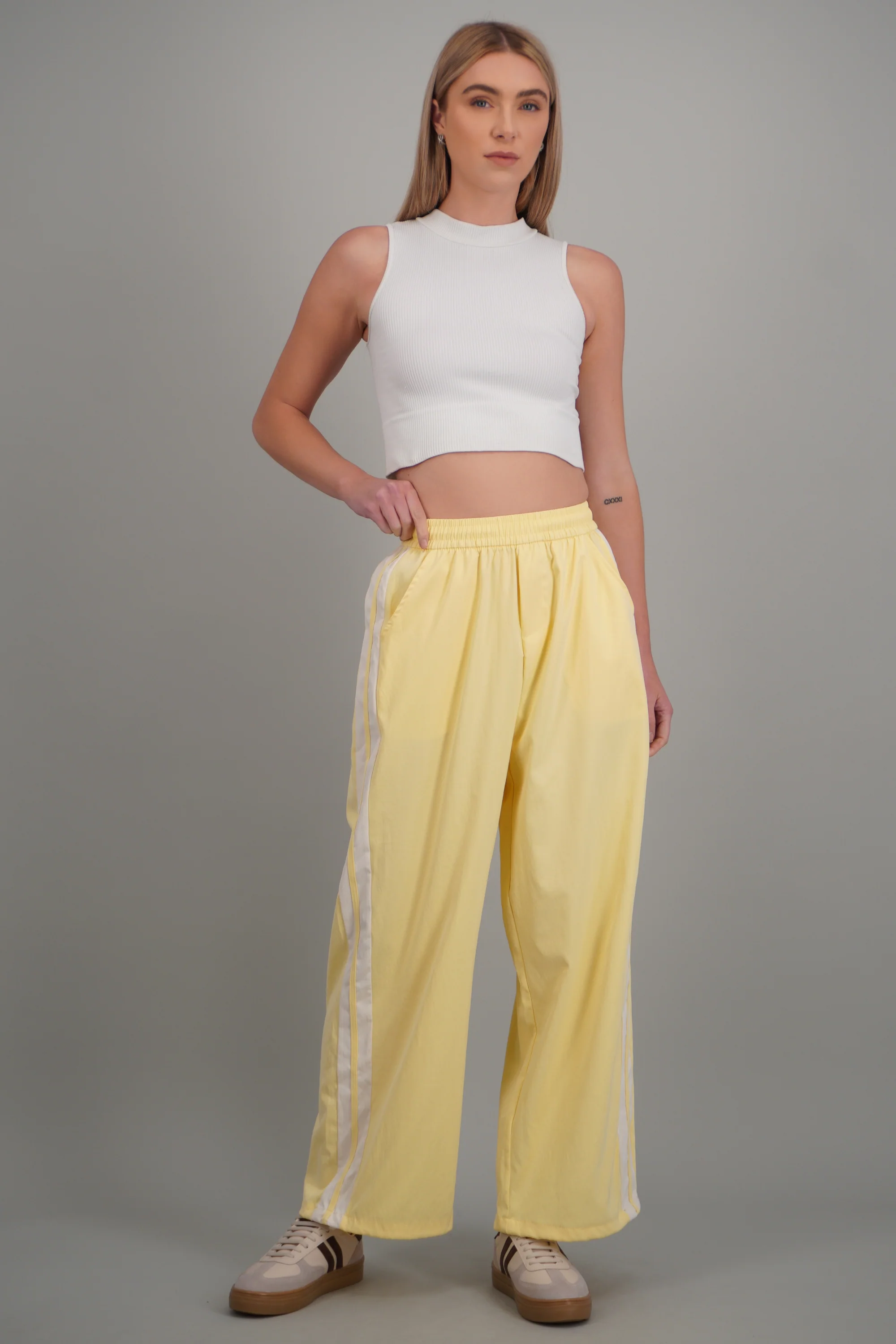 Pantalon rayas en costados